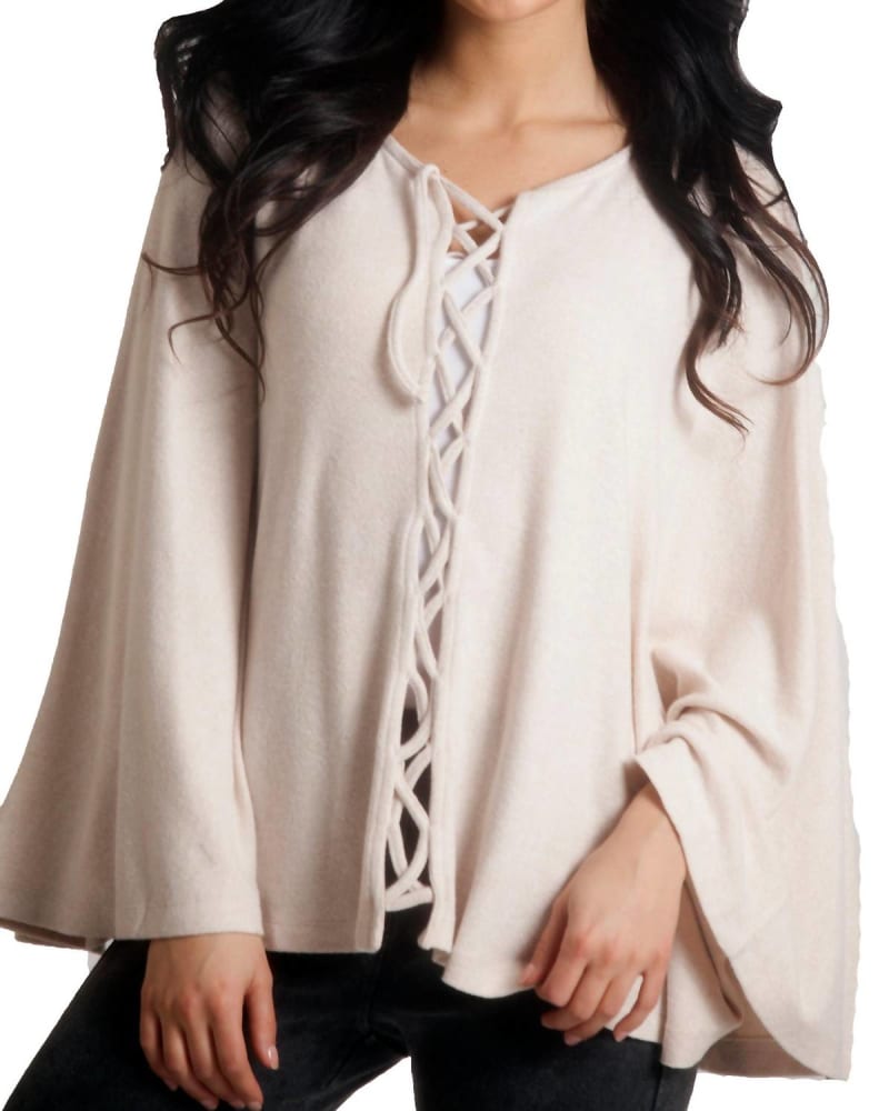 Front of a model wearing a size LG Jessica Kashmira Poncho in Beige in Beige by french kyss. | dia_product_style_image_id:327547
